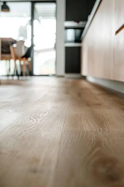 Modern living room, luxury vinyl flooring, wood-look, natural light, minimalistic furniture