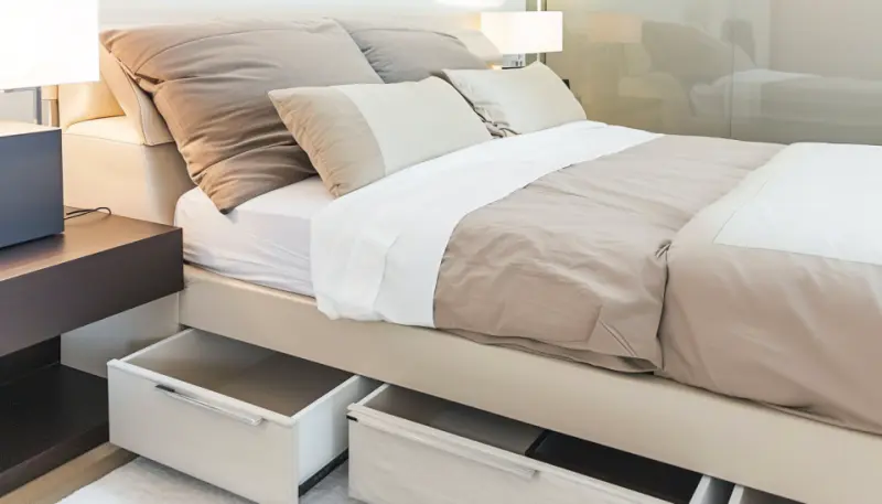 small bedroom, under-bed storage, minimalist decor, light color scheme, space maximizing tips, functional bedroom design.