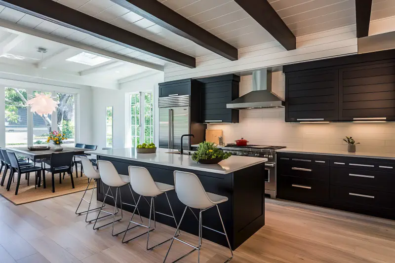 Modern kitchen design highlighting black cabinets and white beamed ceilings style